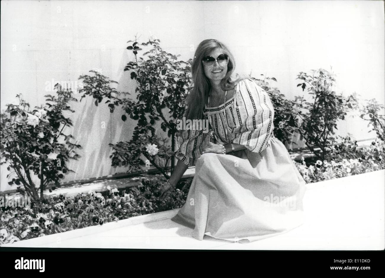 May 05, 1977 - Dalida in Athens for fun and Business: Well-known French Singer and entertainment artist Dalida came to Athens this week to mix business with pleasure. The business part came with an invitation by the Greek National Television network for her to make a one-hour musical spectacular exclusively with a Greek background. The singer however also seized the chance to add on a few more days purely for a bit of relaxation under the Greek sun. Newsmen appeared to be interested above all in her political beliefs. Questioned at Athens airport she said: Politics mean very little to me Stock Photo