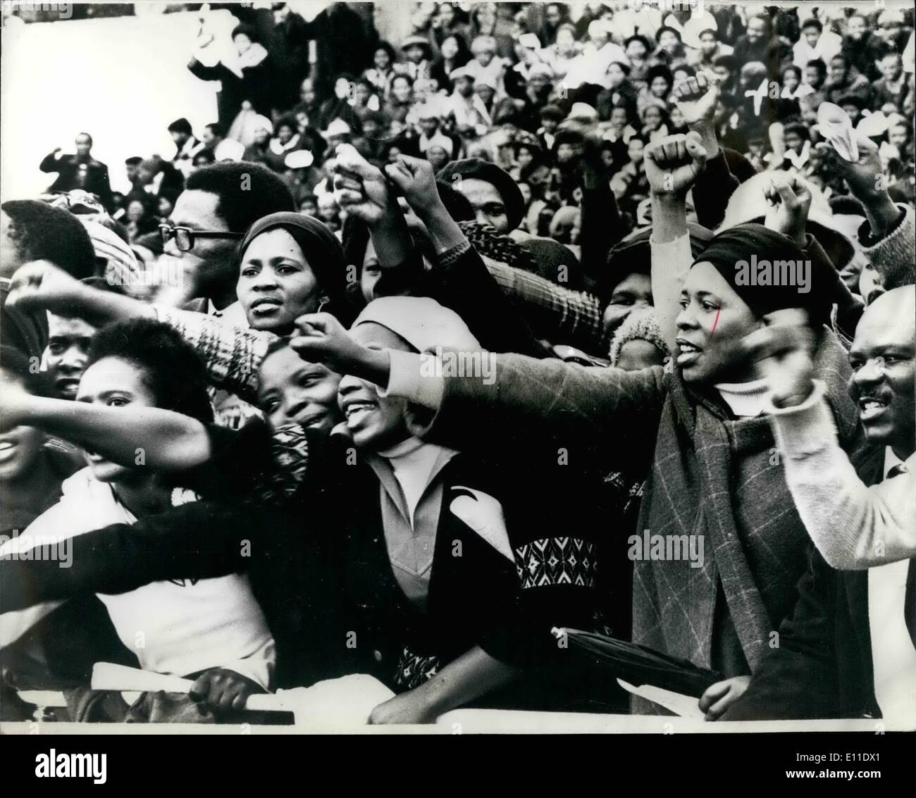 Sep. 09, 1977 - 20,000 Attended Funeral Of Black Leader Steve Biko: An estimated 20,000 people attended the Sports Stadium funeral of 30 year old Steve Biko, the black leader who died a fortnight ago in a police call in Pretoria. It took place in King William's Town., South Africa. Speakers at the five hour service belief that Biko died violently. Photo shows Changing Black women giving the black power salute during the service for Black Leader Steve Biko in the Sport Statium at King William's Town, South Africa, last sunday. Stock Photo