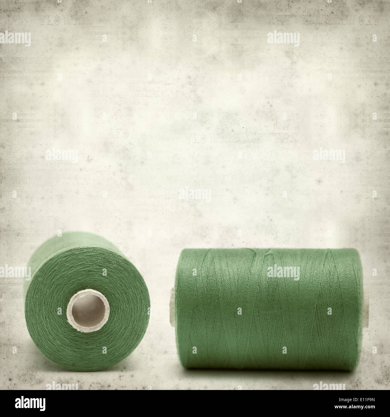 textured old paper background with sewing thread Stock Photo - Alamy