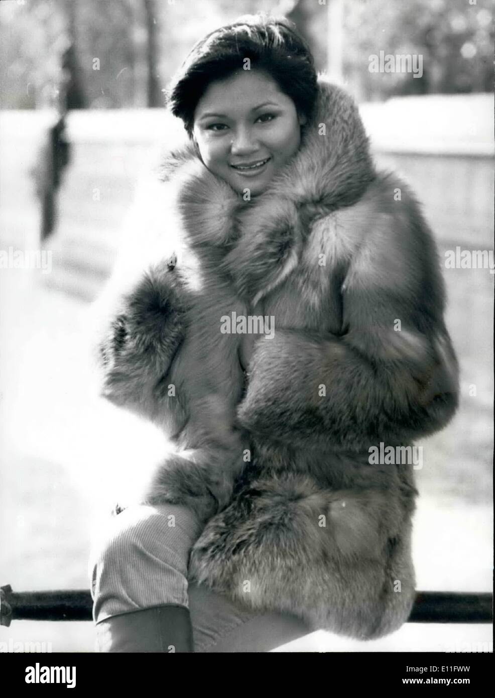 Nov. 11, 1977 - Frances Yip ''Lady of song'' from Hong Kong: Frances Yip, who will be starring in Cabaret in the Savoy Restaurant for two weeks from Tonight. In her native Hong Kong she was twice voted the most popular singer on television and has more than 60 albums to her credit in both Chinese and English. She has had an album released in Britain by EMI, Frances comes to the Savoy cabaret followin success at Singapore's Shangri-la Hotel being voted ''Most successful entertainer of the year'' for 1976. Photo shows Frances Yip well wrapped up against the cold weather in London today. Stock Photo