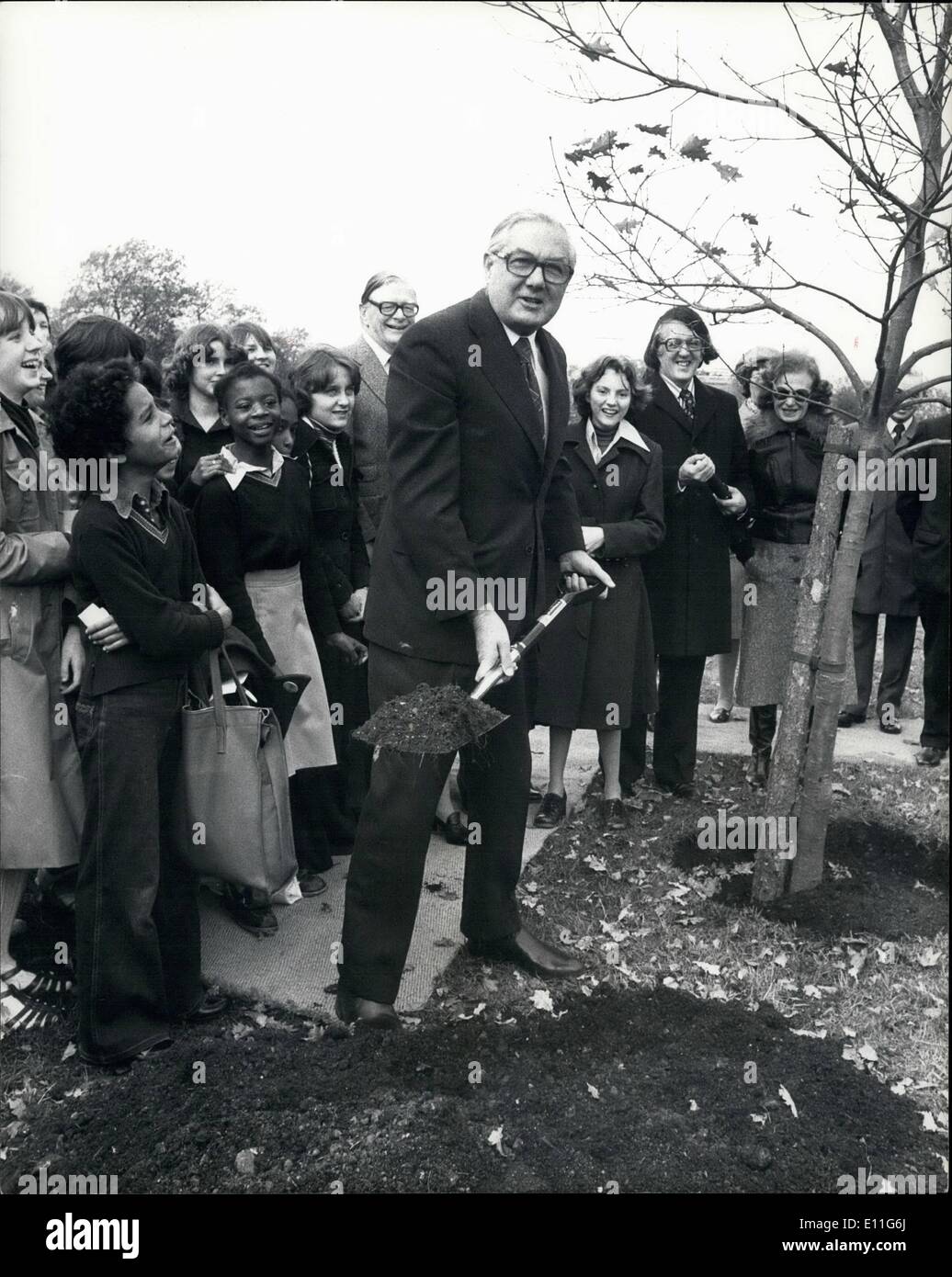 Nov. 11, 1977 - Prime Minister Plants a tree: The Prime Minister Mr. James Callaghan planted an Oak tree on the site of a former Oak in Hyde Park today on behalf of the Tree Councils Tree planting work. The former ~~~ tree was known as the Reformist Tree and was planted in the early 19th century, but was vandalized. Photo shows The Prime Minister Jim Gallagham seen planting the Oak tree in Hyde Park today. Stock Photo