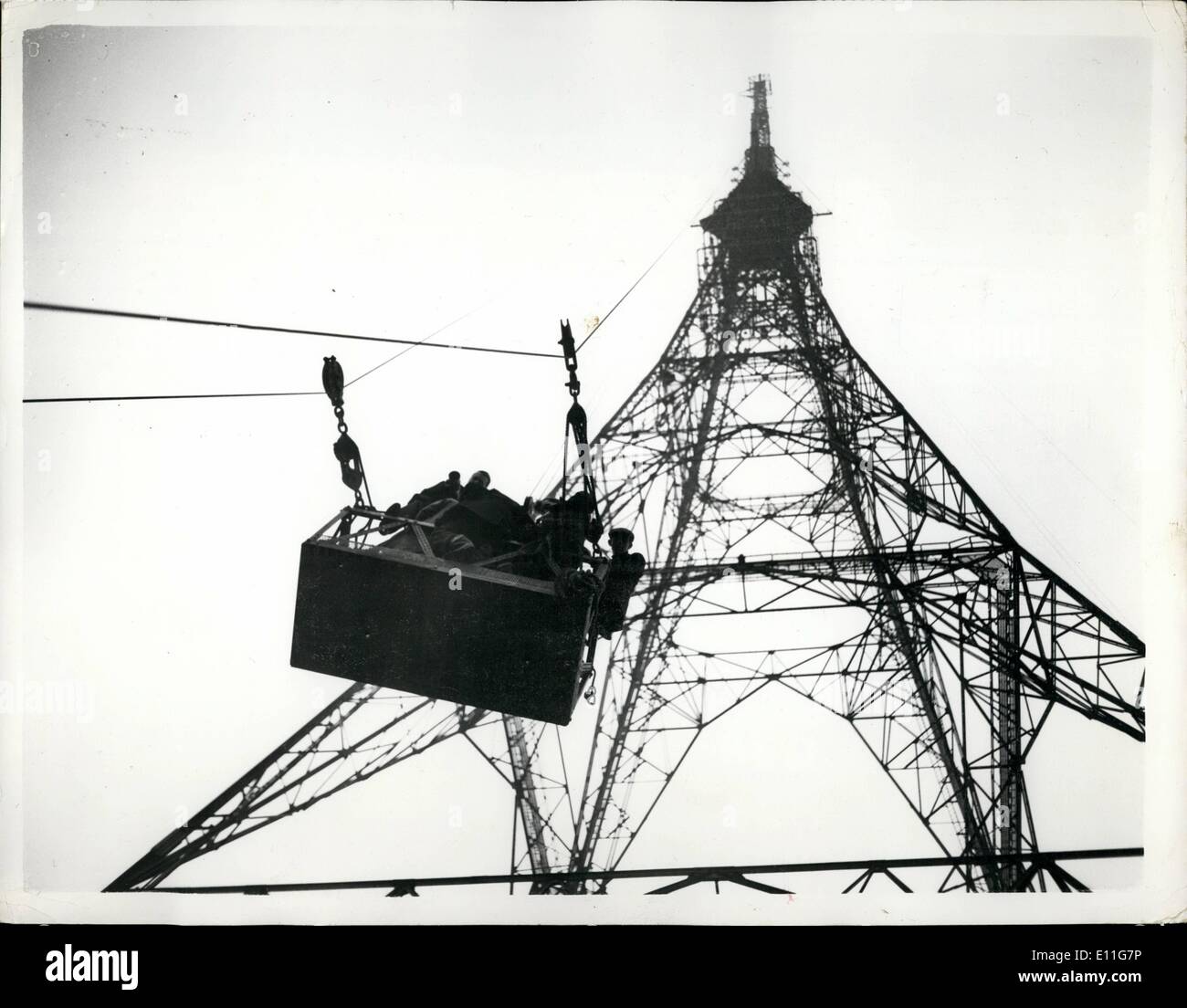 Nov. 11, 1977 - Testing the new B.B.C. Television mast with the aid of rockets - at Crystal palace: The new B.B.C. Television Mast - which is 700ft. high - underwent an aerodynamic test today - when a battery of ten rockets mounted on the tower at a height of 625ft. above ground level - and fire din sequence.. The rockets were a fixture - and when fired - each one created a thrust of half a ton.. Any movement of the tower being recorded on electron equipment in a mobile laboratory Stock Photo