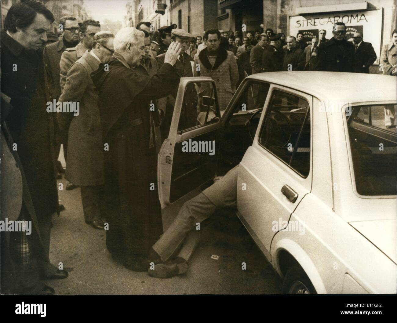 Feb. 02, 1978 - The Red Brigades hit again in Italy. Judge Palma, 63 years old, was killed with a rifle while he was leaving his home in Rome at the steering wheel of his car, headed to his office. Armed Man Walks Through Shrub Filled Area Followed By Other Stock Photo