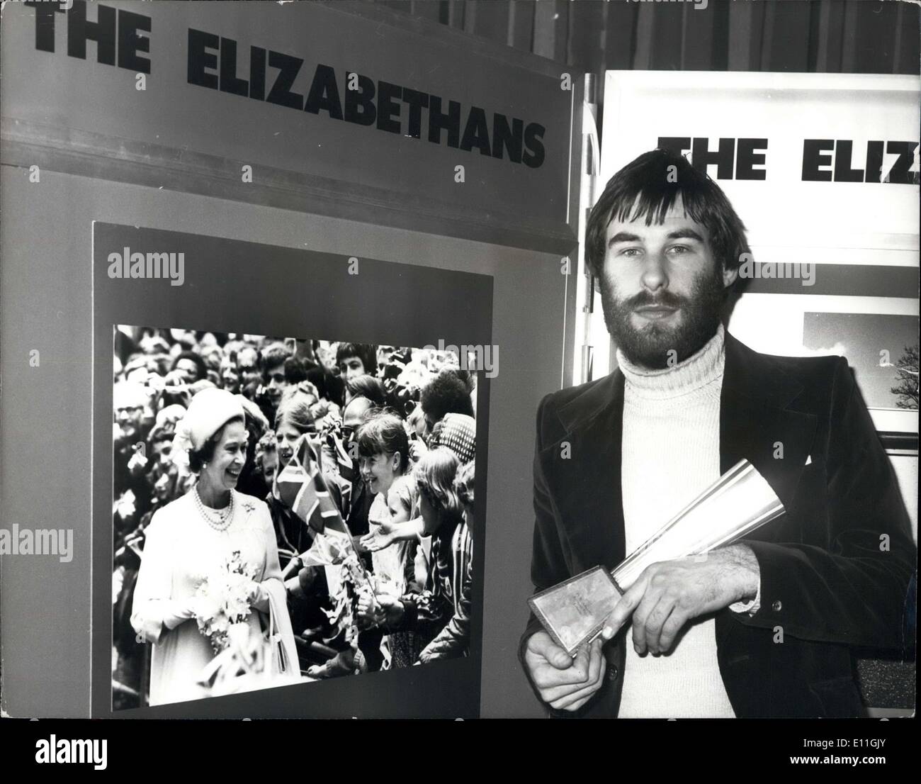 Nov. 30, 1977 - Photographer Of The Year Dave Ashdown Of Keystone: Wit his picture Keystone Cameraman Dave Ashdown, won the title Ilford photographer of the year and the award of 1,000 in this year's special ''Elizabethan Category''. Photo shows 26-year old Dave Ashdown the Keystone photographer seen with his trophy and his award winning picture which won him the title of the ''Ilford photographer of the year'' in London last night. Stock Photo
