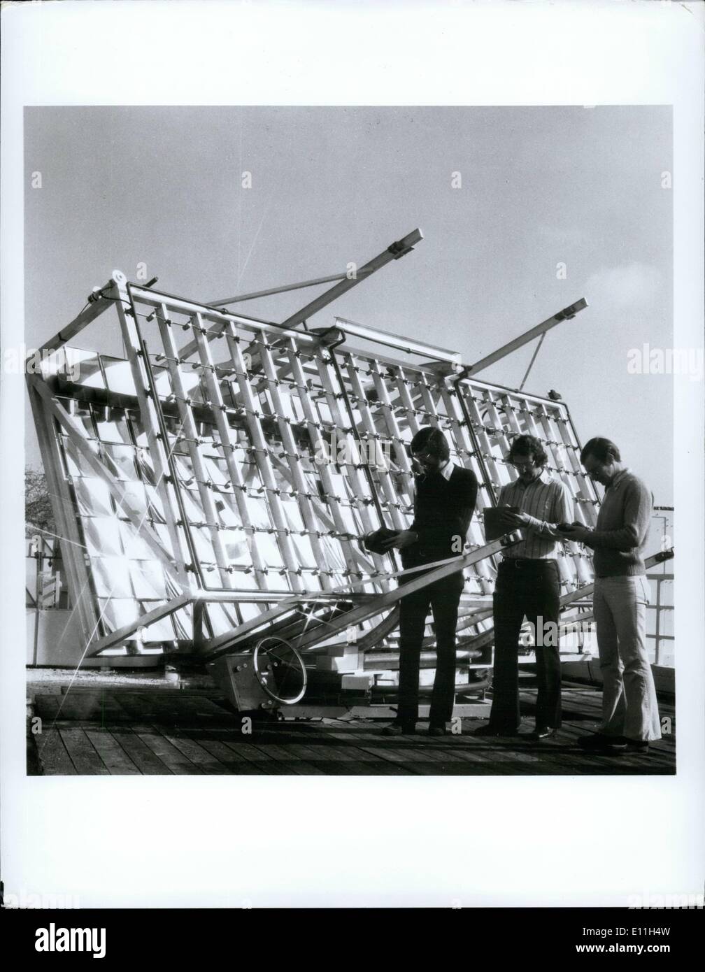 Mar. 03, 1978 - A one kilowatt array of photovoltaic cells that converts solar energy directly into electrical energy has been built as part of the Varian Associates' solar energy research program. Headed by scientists Larry James, Ron Moon and Hugh VanderPlas (left to right), the program has demonstrated efficiencies up to 23.3 percent for the conversion process using gallium arsenide cells. New contracts awarded to the company by the Department of Energy call for further efficiency improvement and construction of an experimental solar conversion, 50-kilowatt power plant Stock Photo