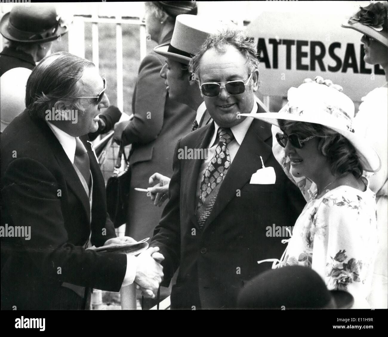 Jun. 06, 1978 - Derby Day : Photo shows Sir Freddie Laker, center, is greeted by a friend during his visit to Epsom today with her wife. Stock Photo