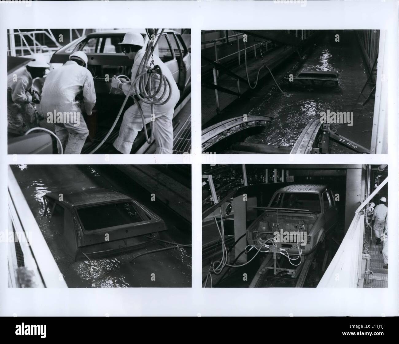 Apr. 04, 1978 - Electrified Paint -- paint department employees attach electrodes to vw Rabbit body shell before it takes its over - the roof plunge into a 55,000- gallon electricoat bathtub in Volkswagen westmoreland's paint department. Upper right photo shows it nearly submerged as it backs down into the tub of primer paint Stock Photo