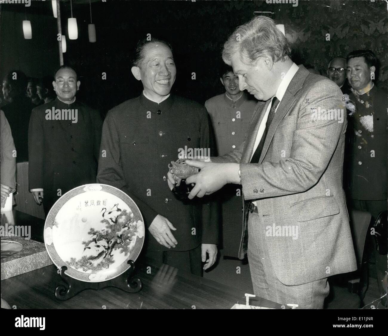 May 05, 1978 - Chinese Delegation Visits Britain : Ku Ming, Vice-Minister in charges if China's State Planning Commission, presenting an Incense Burner to ward off Evil Spirits and a porcelain plate to Mr Dell, Trade Secretary, when they met in London yesterday at the start of a three week visit by Chinese Delegation interested in British Technology. Stock Photo
