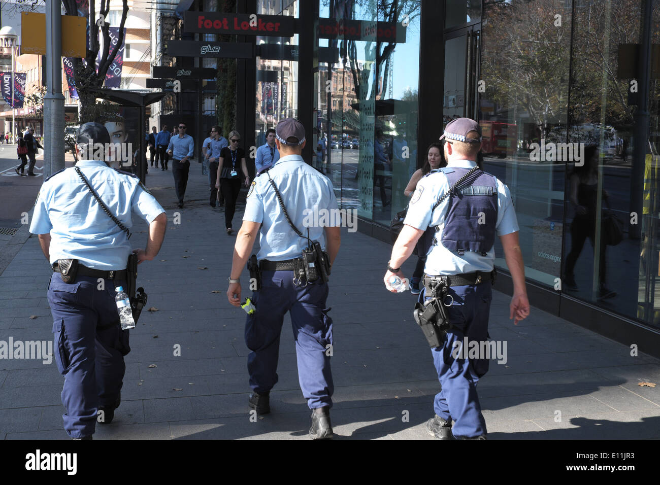 Armed Police, Sydney and NSW policemen officers in Sydney city centre on patrol, NSW, Australia,2014 Stock Photo