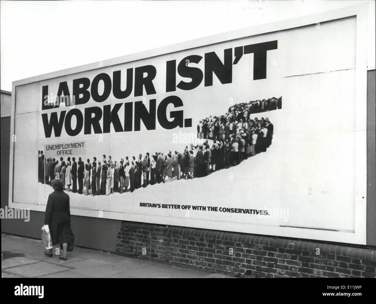 Aug. 08, 1978 - Conservative Poster Upsets Labour The Conservative poster ''Labour Isn't Working'' thought up by the two brothers Morris and Charles Saatchi, has infuriated the Prime Minister Jim Callaghan and the Chancellor Denis Healey. The Chancellor, in speech accused the Tories of hiring the Advertising agency Saatchi, and Saatchi, to ''sell Mrs. Thatcher as if she was a soap powder''. The Labour also accused the Tories of spending about two million on pre-election advertising. Stock Photo