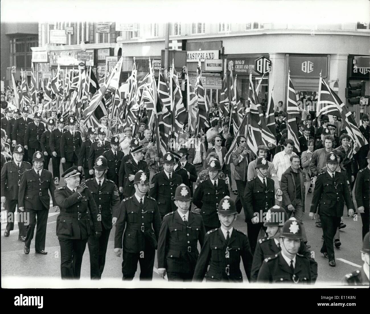 Sep. 09, 1978 - National Front And Anti-Nazi League March In London: Police marching in strength with a National Front procession in Charing Cross Road yesterday to ward off any confrontation with Anti-Nazi league demonstrators held a march at the same time. The Front supporters, led by Martin Webster (in white), were on their way to Shoreditch. The Anti-Nazi League held a meeting in Hyde Park before marching off to Brixton-the police keeped them well apart. Stock Photo