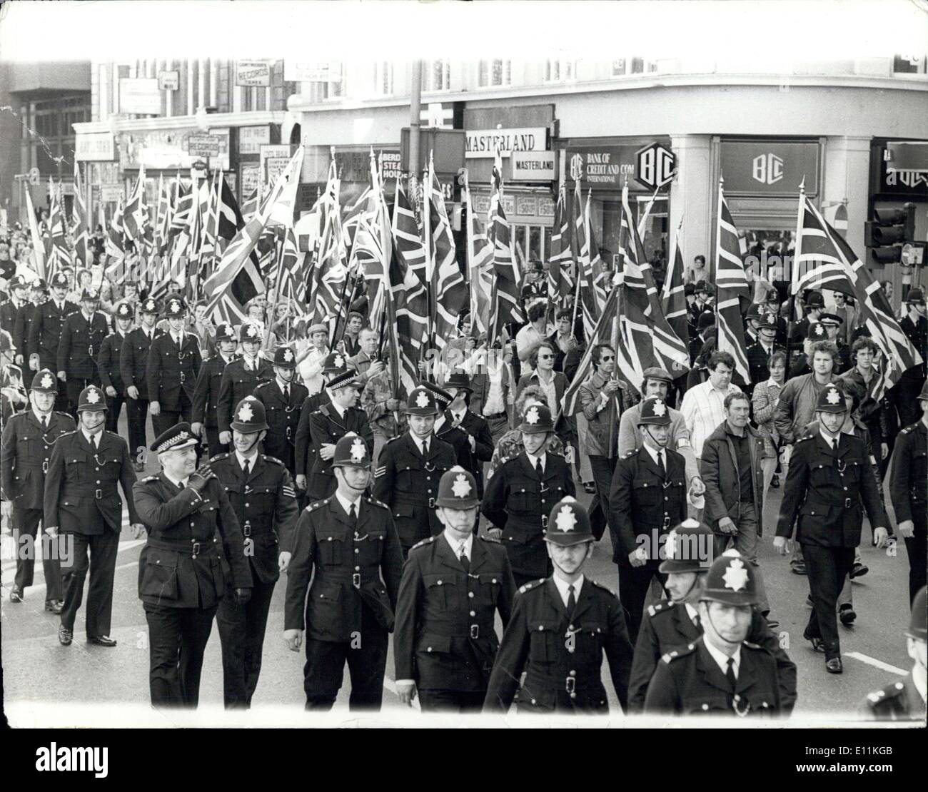 Sep. 25, 1978 - National Front and Anti-Nazi League March in London: Police marching in strength with a National Front procession in Charing Cross Road yesterday to ward off any confrontation with Anti-Nazi league demonstrators held a march at the same time. The Front supporters, led by Martin Webster (in white), were on their way to Shorediton. The Anti-Nazi League held a meeting in Hyde Park before marching off to Brixton-the police keeped them well apart. Stock Photo