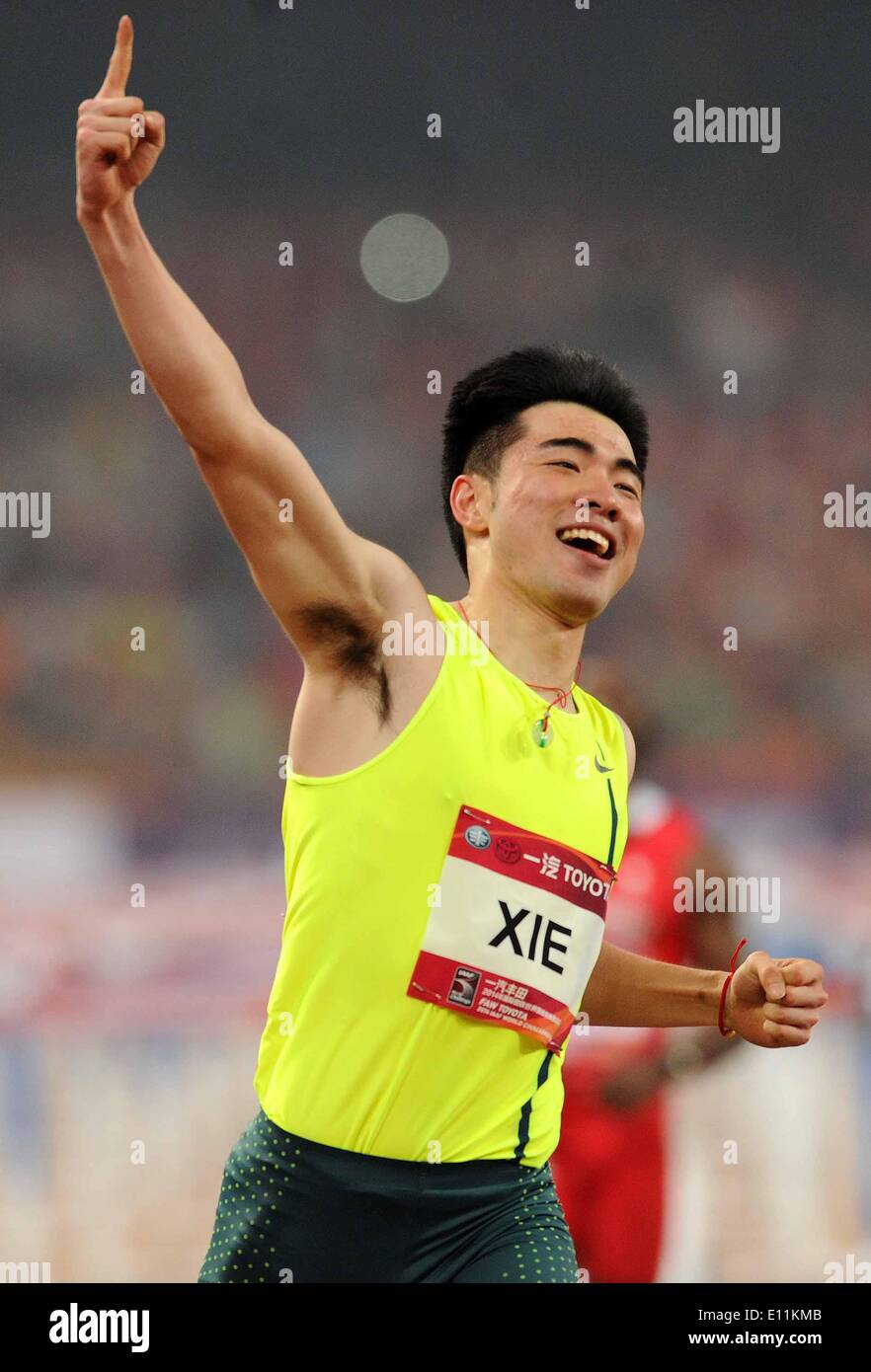 Beijing, China. 21st May, 2014. Xie Wenjun of China celebrates after ...