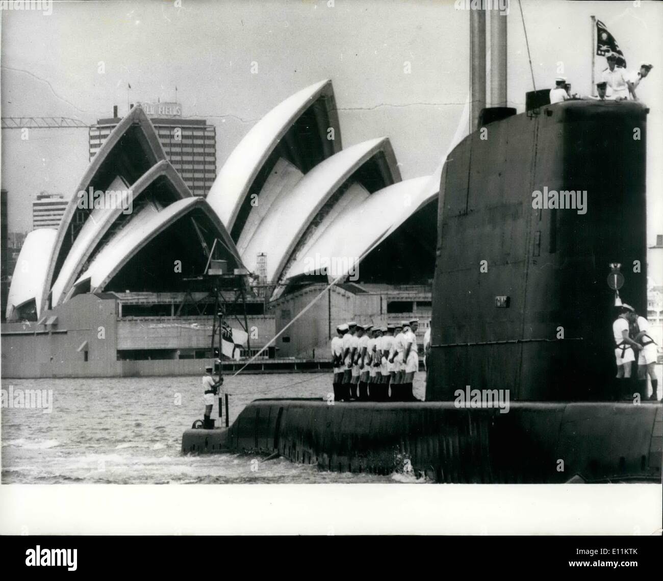 Jan. 01, 1979 - EXIT THE ROYAL NAVY - FLYING THE JOLLY ROGER, Flying the J lly Roger, HMS TRUMP - the last British link with the Royal Australian Navy - sailed out of Sydney recently. The J,11y Roger one the pr,ud emblem of her victriee in World War II, She was the laet Brit/Ai sub to sink an enemy veaeel, For the 65-man area it was the last goodbye to Sydney. The Trump was going home to the wreckers, And with her departure Australia will go. it alone - with her own submarine service. The first moves to give Australia an independent navy date back to 1913 Stock Photo