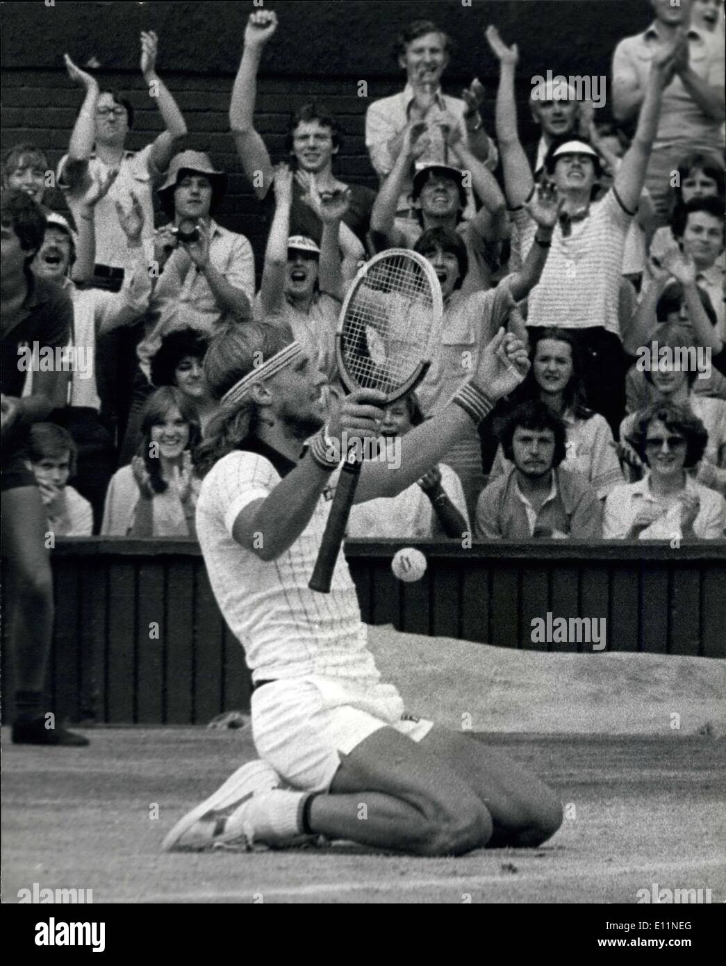 Jul. 07, 1979 - Bjorn Borg wins Wimbledon for the fourth time in a row: Today of the Centre Court at Wimbledon Bjorn Borg of Sweden won the Men's Singles title for the fourth Seccessive time when he beat the American Roscoe Tanner in five sets. Photo shows Borg falls to his knees with his arms in the air after beating Roscoe Tanner. Stock Photo