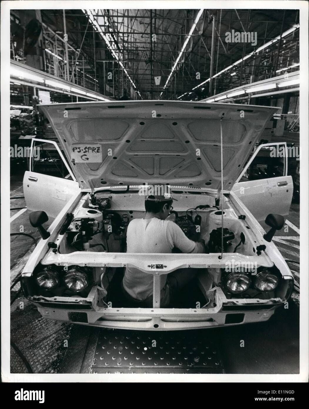 Apr. 04, 1979 - A Japanese workman installs fittings, on the trim line of Nissan Motors Oppama Plant, in a Datsun Car. I Stock Photo
