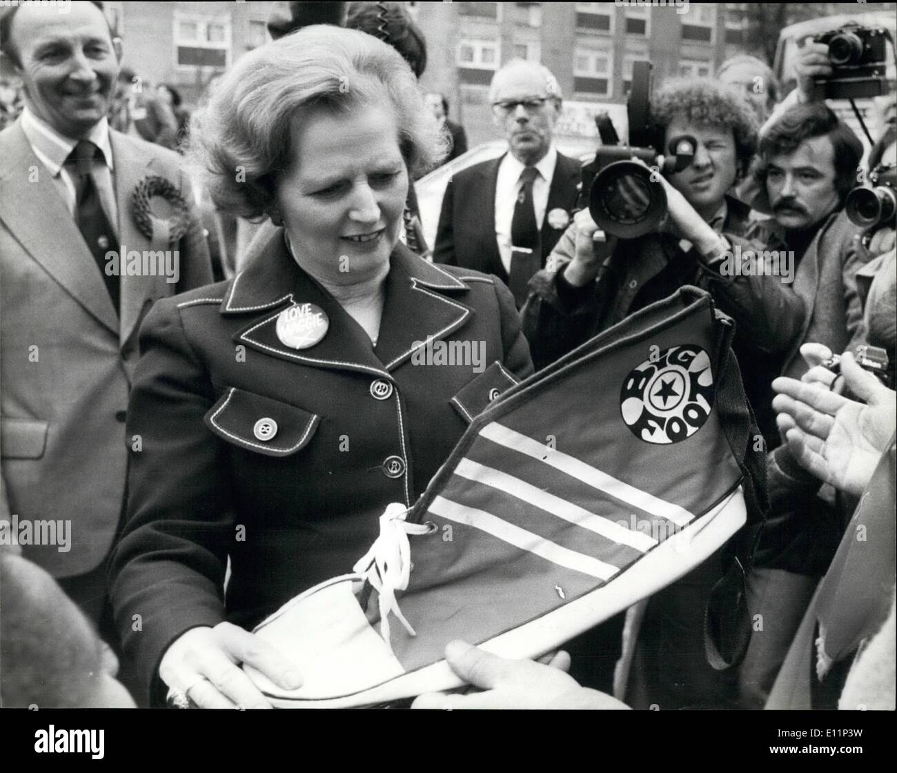 May 05, 1979 - Mrs. Thatcher Is Given The Boot: Mrs. Margaret Thatcher is handed a large boot during her visit to the Conservative Party Committee Rooms in Lewisham, South london this afternoon-it was given to her by the Tory Candidate for Lewisham West Mr. kemp, it is to kick Jim Callaghan out of office. Stock Photo