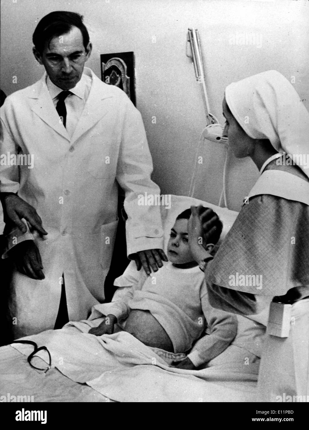 May 18, 1979; Rome, Italy; Hearth surgeon CHRISTIAN BARNARD came in Rome to examine some children hearth sufferer at the request of Italian actress Sophia Loren, who met the children, cried with their parents and wrote to Barnard appealing to him help. The picture shows prof. CHRIS BARNARD visiting the child PAOLO FIOCCA who suffered for the 'blue blood', at the Moscati Clinis today, immediately after his arrival in Rome. Stock Photo
