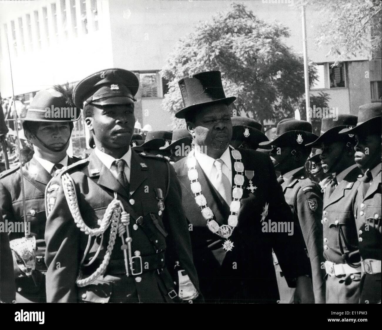 Jun. 06, 1979 - Ceremonial opening of the First Parliament of Zimbabwe-Rhodesia. The ceremonial opening of Parliament in Salisbury of the first Black Parliament of the country of Zimbabwe-Rhodesia, took place on Wednesday the 26th of June. Photo Shows: President Gumede, the first President of Zimbabwe, seen inspecting a guard of honour during the opening of Parliament. The topper he was wearing had to be borrowed from a local magician as there wasn't a size 7&frac12; to be found for Gumede anywhere in Salibury. Stock Photo