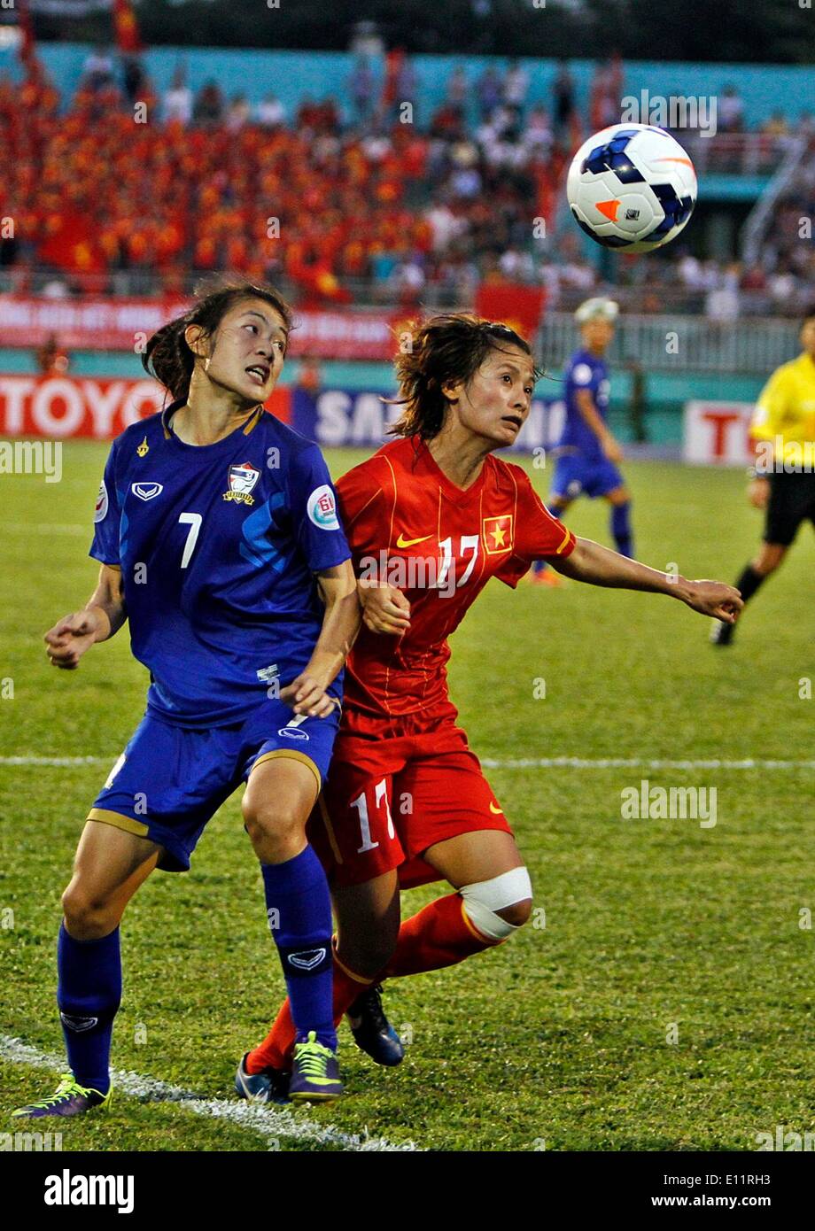 Ho Chi Minh City, Vietnam. 21st May, 2014. Intamee (L) of Thailand vies for the ball during the match against Vietnam at the 2014 Women's AFC Cup held at Thong Nhat Stadium in Ho Chi Minh city, Vietnam, May 21, 2014. Thailand advanced to 2015 World Cup after beating Vietnam 2-1. © Nguyen Le Huyen/Xinhua/Alamy Live News Stock Photo