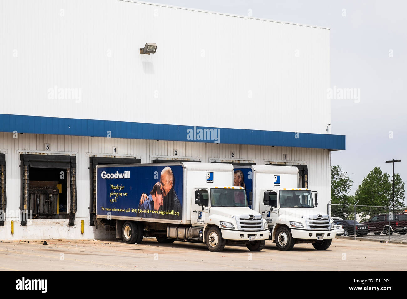 The loading docks, building and trucks of a Goodwill charitable