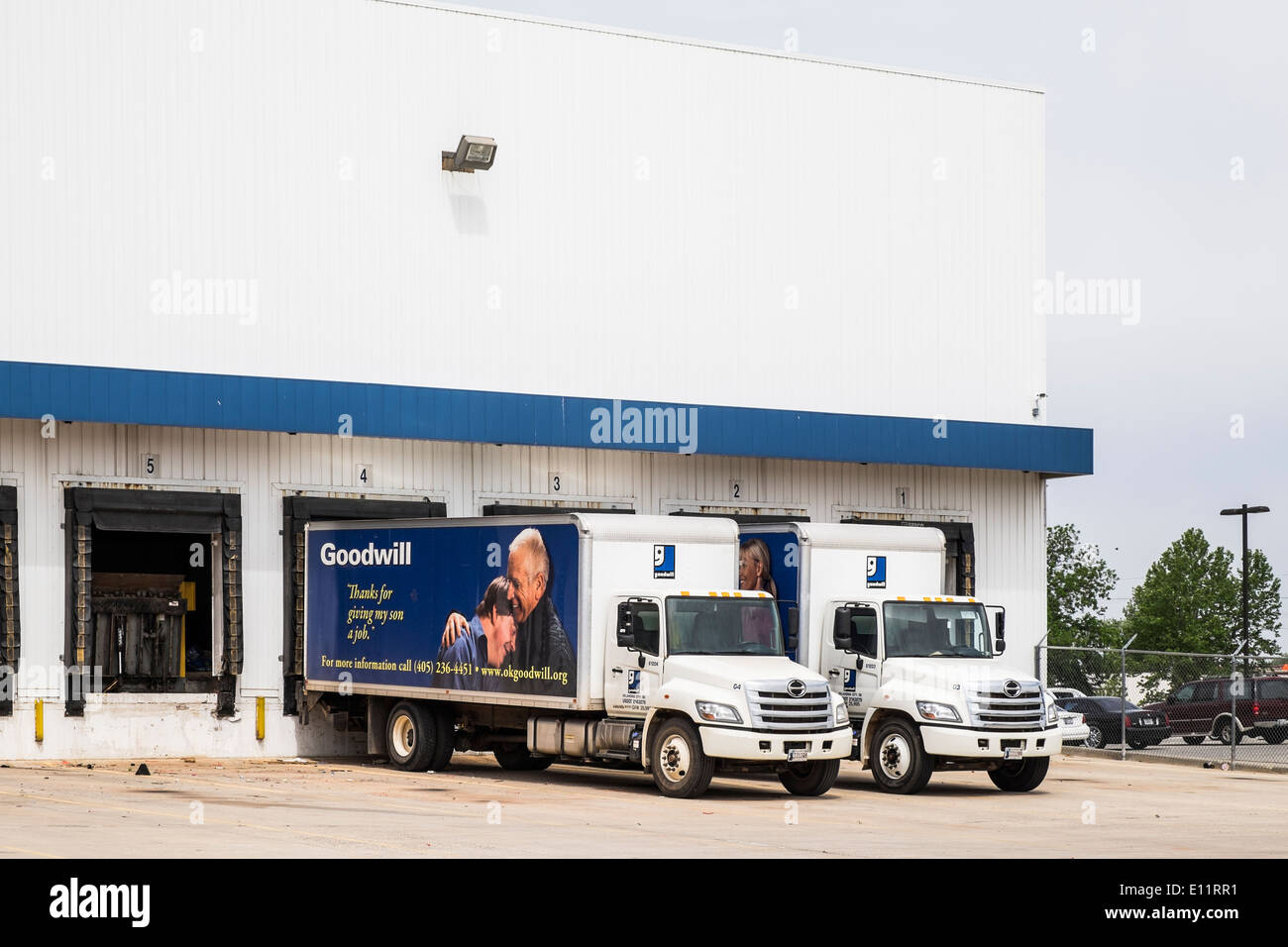 The loading docks, building and trucks of a Goodwill charitable organization in Oklahoma City, Oklahoma, USA. Stock Photo