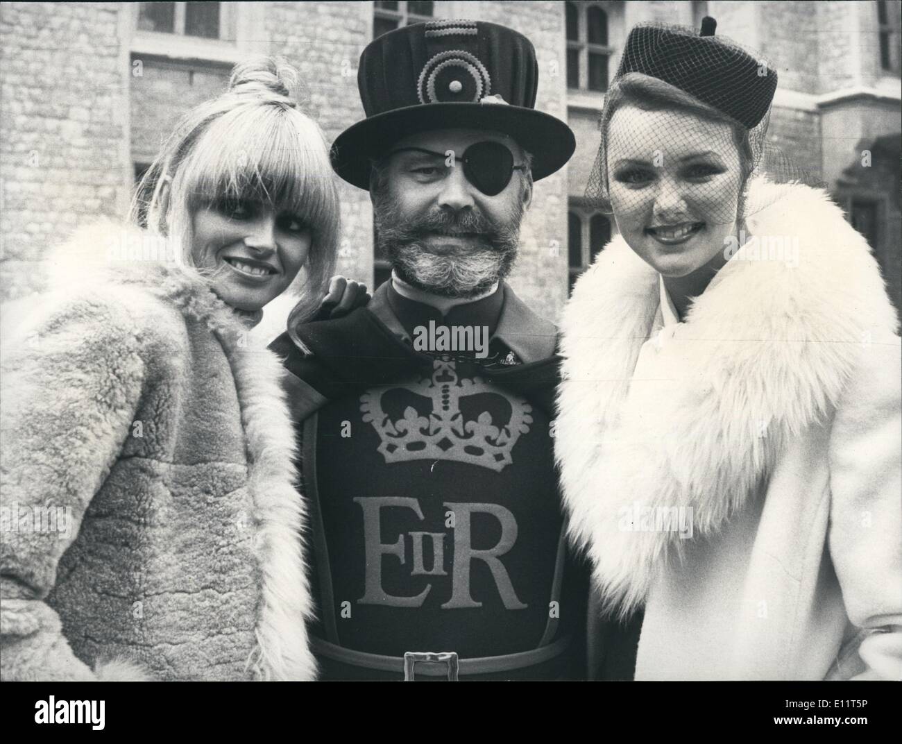 Nov. 11, 1979 - Miss World Contestants Visit the Tower: Some of the Miss World Contestants made a visit to the tower of London today. Photo Shows Miss Australia, left and miss Isle of with Yeoman Warder Joe David during their visit to the tower of London Today. Stock Photo