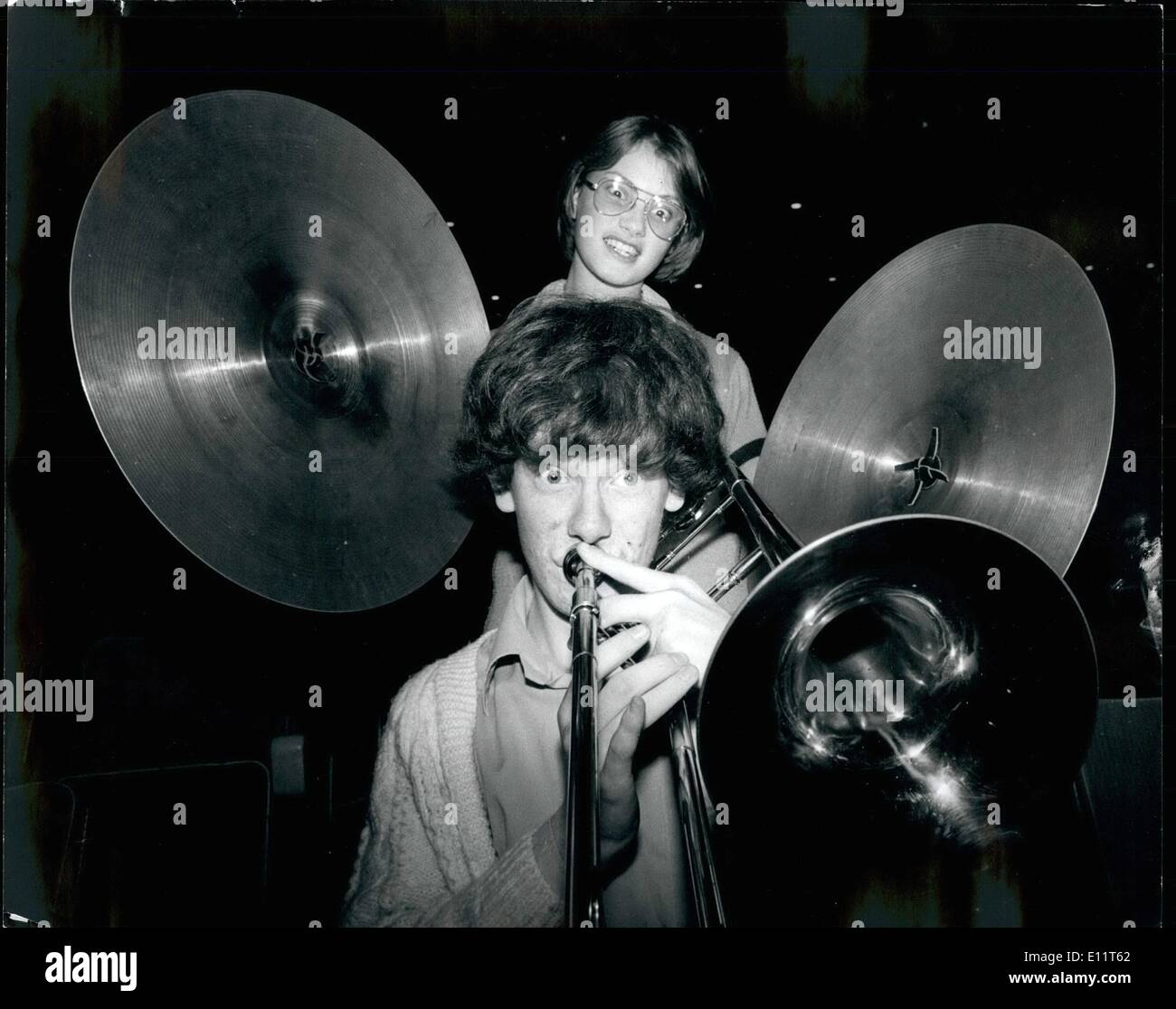 Nov. 11, 1979 - Stand By For The Bang: 17 year-old Gary Davies looks like he is going to get his head caught between the symbols of Tania Staite, also 17, from the Kingsway-Princeton College Kings Cross, during 'Sing for Christmas' Carol Festival at the Royal Festival Hall in London. Stock Photo