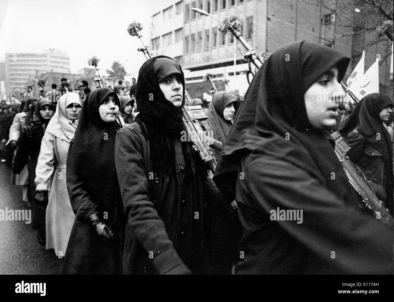 Feb 23, 1980; Teheran, Iran; Iranian women dressed in the traditional chador marching past the U.S. Embassy in Tehran. (Credit Stock Photo