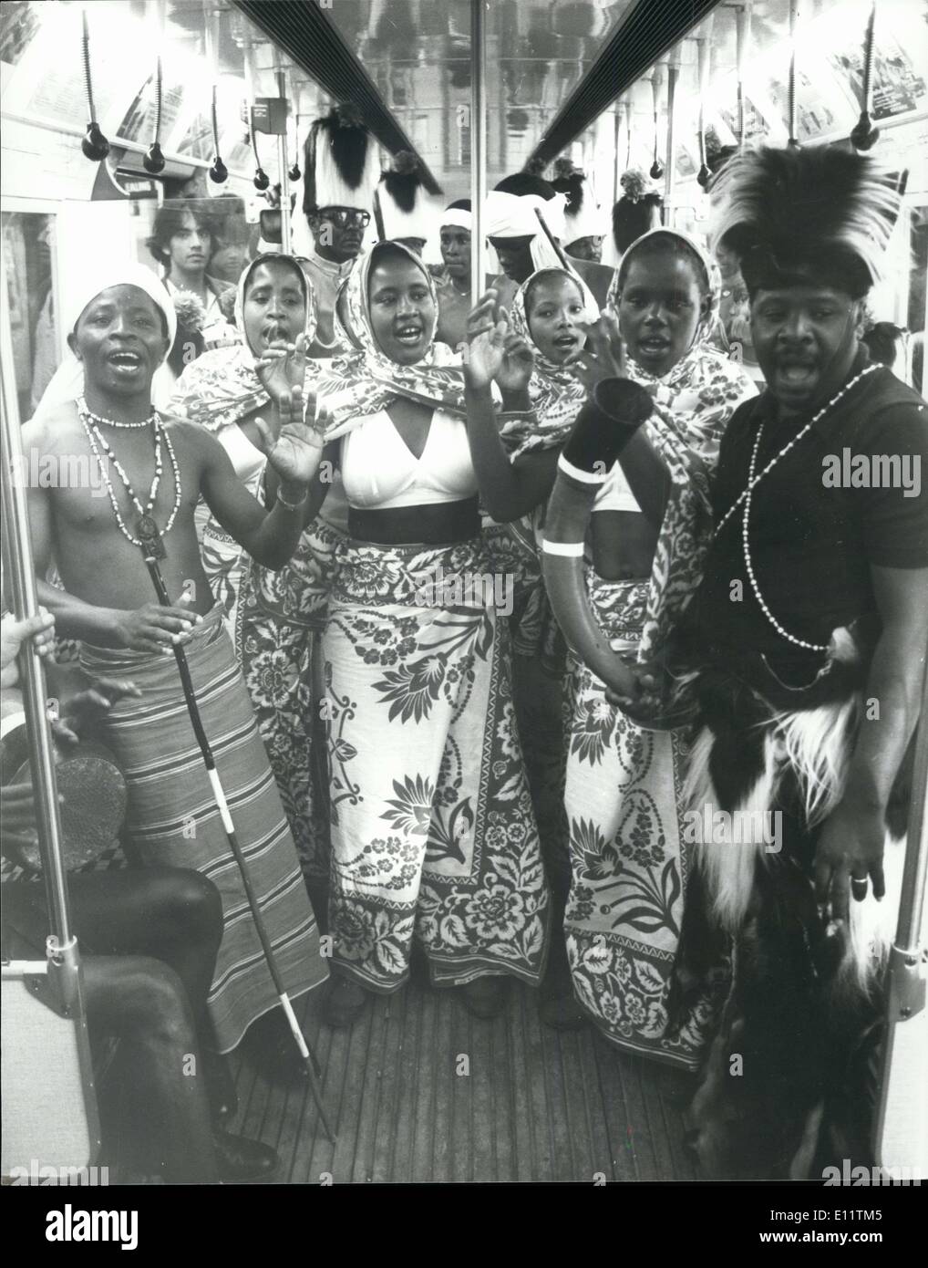 Jul. 07, 1980 - Members of The Kenya Army Band And Dancers Go By Underground Members of the Kenya Army Band and Dancers travelled on the London Underground yesterday as they went from St. James's Park to Horse Guards Parade, to take part in a preview of the Centenary Royal Tournament, which opens at Earls Court on Wednesday. Photo Shows:- Members of the dance group singing during their journey on the Underground. Stock Photo