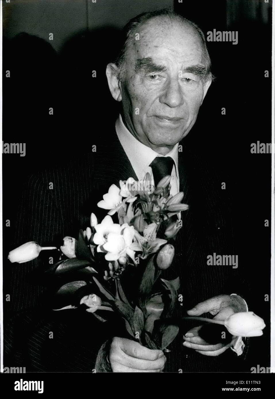 Jul. 07, 1980 - 80. Birthday of Arno Baker.: Flowers for the birthday - child.There are surely enough at July 19th,when Arno Baker ( Picture ) becomes 80 years old. The sculptor and graphic - artist who is famous wide over the frontiers of West - Germany, was born in Elber - feld / West - Germany and a pupil of Hubert Netzer, in the early twenties he came to Paris where he met Calder and Marc Chagall and where he found recognition by Maillol and Despiau with his first works. At the beginning of the Thirties Arno Baker returned on impulse of Max Liebermann to Germany Stock Photo