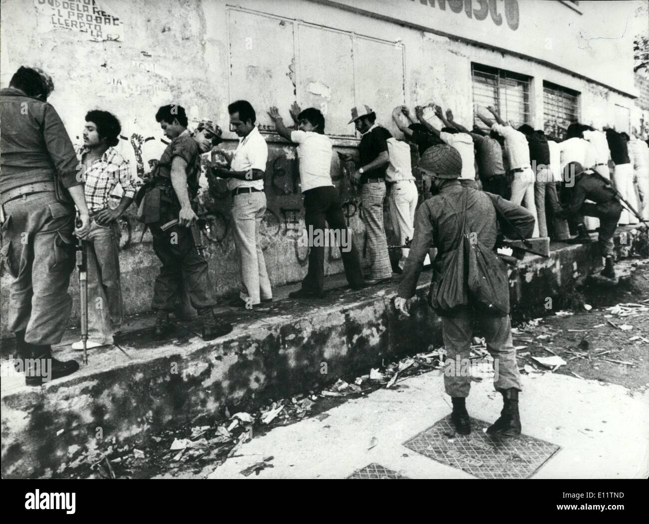 Jul. 07, 1980 - The People Fight the Army in San Salvador: These days, the political situation in E1 Salvador is on the brink of civil war, as more ad more clashes are taking place between the Army and a large part of the people, especially the young students, in which many have been killed during clashes with the army. Photo shows Young people, many of them students being lined up against a wall and searched by members of the E1 Salbadorian Army during unrest in the Capital San Salvador. Stock Photo
