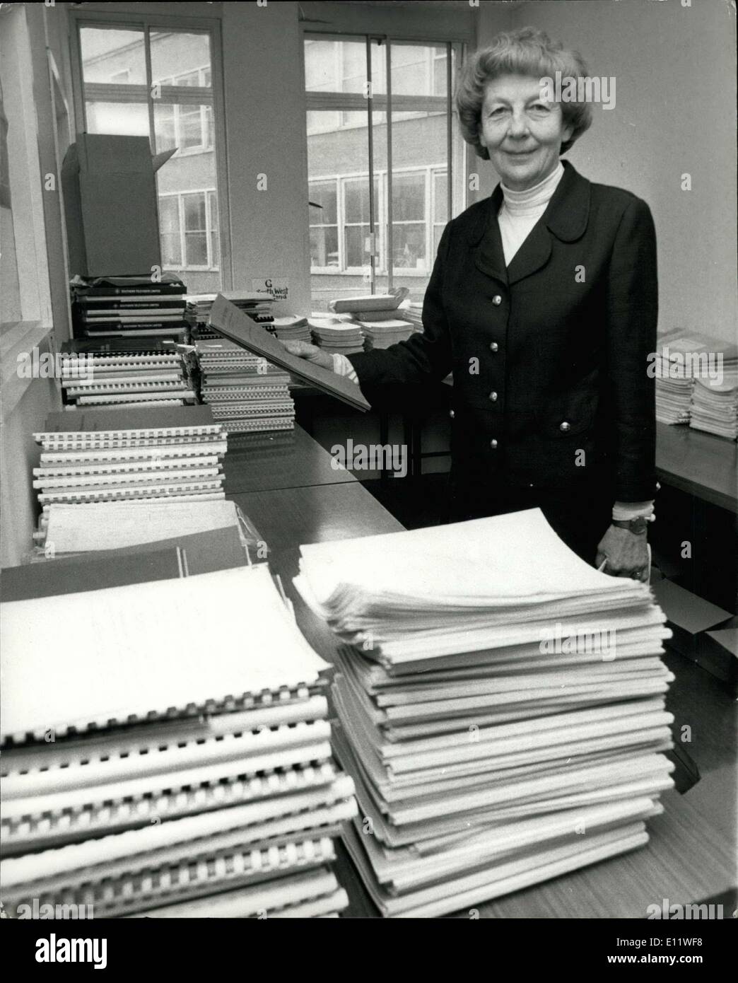 May 12, 1980 - Lady Plowden with applications for TV Breakfast Show: Lady Plowden, Chairman of the Independent Broadcasting Authority, surveying the task ahead at her Knightebridge headquarters, the stacks of applications to be considered for the new ITV franchises which will operate from 1982. Eight which includes Independent Television News, want to start National breakfast-time television. Stock Photo
