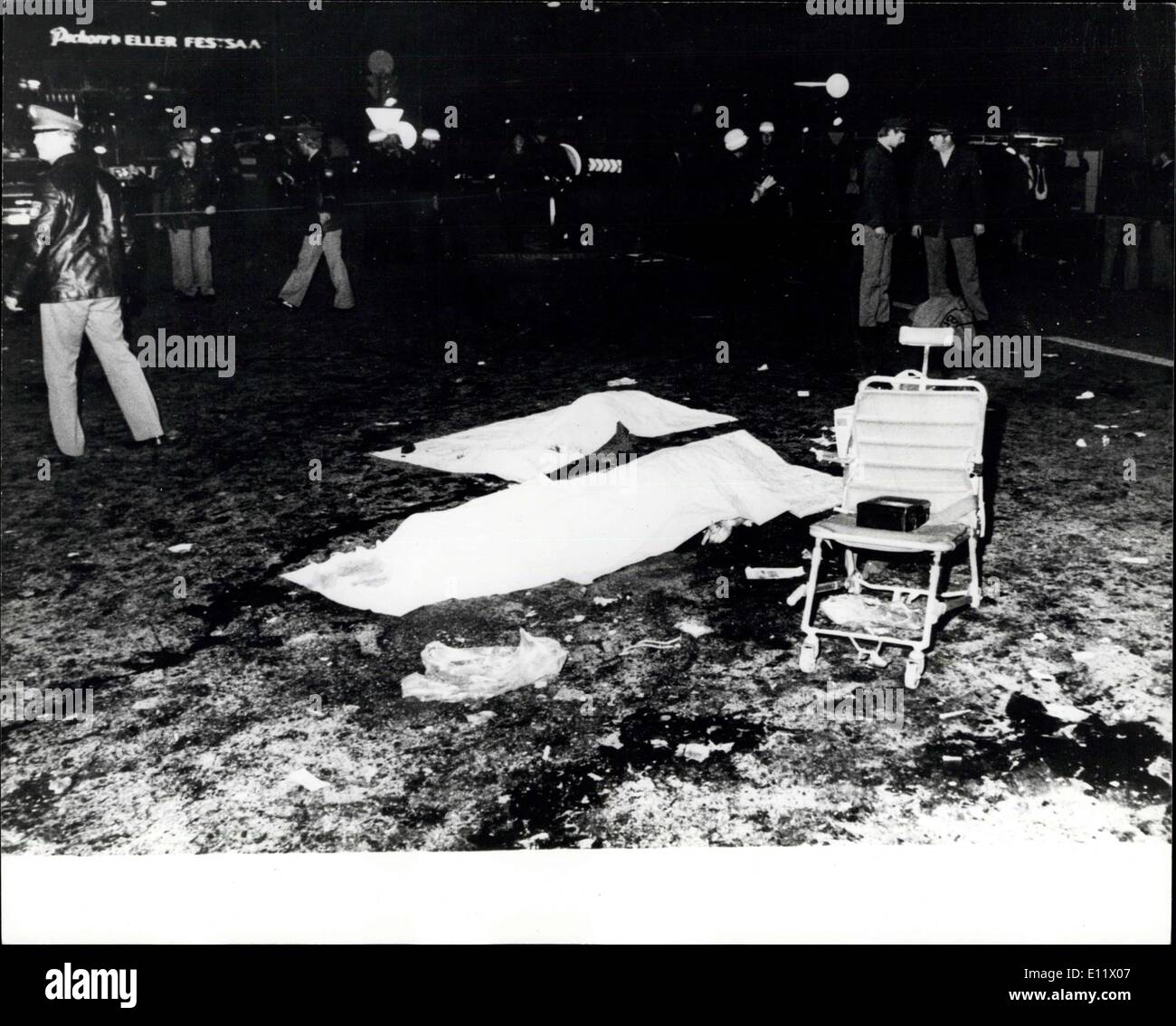Sep. 29, 1980 - 14 Killed And Many Injured In The Munich Oktoberfest Bomb Blast: At least 14 people, which included three children were killed when a terrorist bomb exploded at the Oktoberfest beer festival on Friday night, and about 140 received injures. Photo shows Two of the dead lay under covers after the bomb explosion at the Oktoberfest bear festival in Munich. Stock Photo