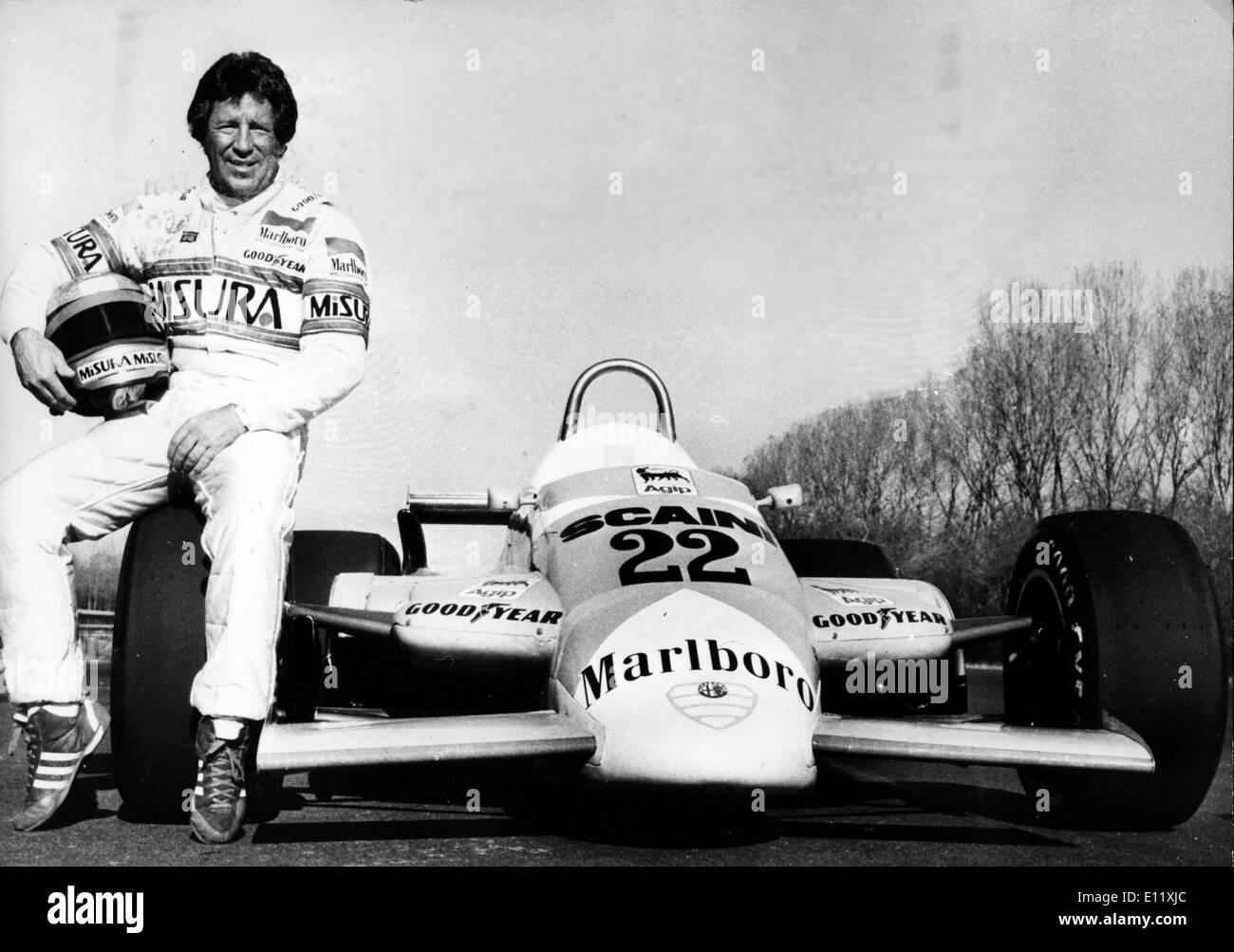 MARIO ANDRETTI, the American racing driver, after a test run in the new Alfa Romeo, Balocco racing track Stock Photo