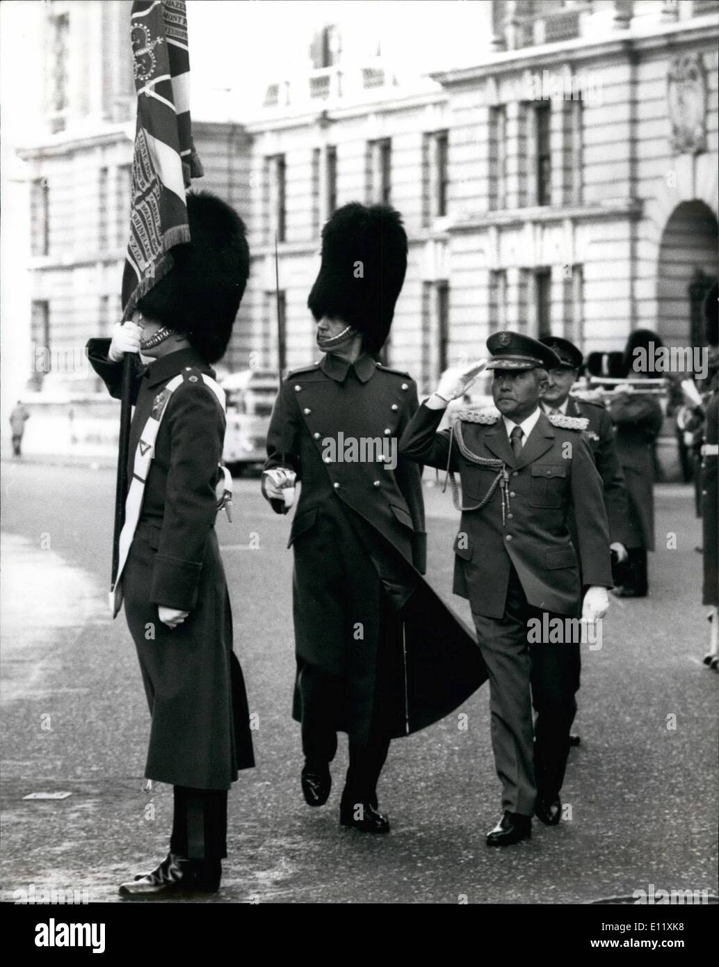 Nov. 11, 1980 - Japanese Chief Of Staff Visits Ministry Of Defence: General Toshimichi Suzuki, Chief of Staff, Japanese Gound Self Defence Force, arrived in London today for a weeks visit, in which he will be visiting the British Army. Photo shows General Toshimichi Suzuki saluting the colours of the 1st Battalion Irish Guards during his inspection of the guard of honour on his arrival at the Ministry of Defence in Whitehall today. Stock Photo
