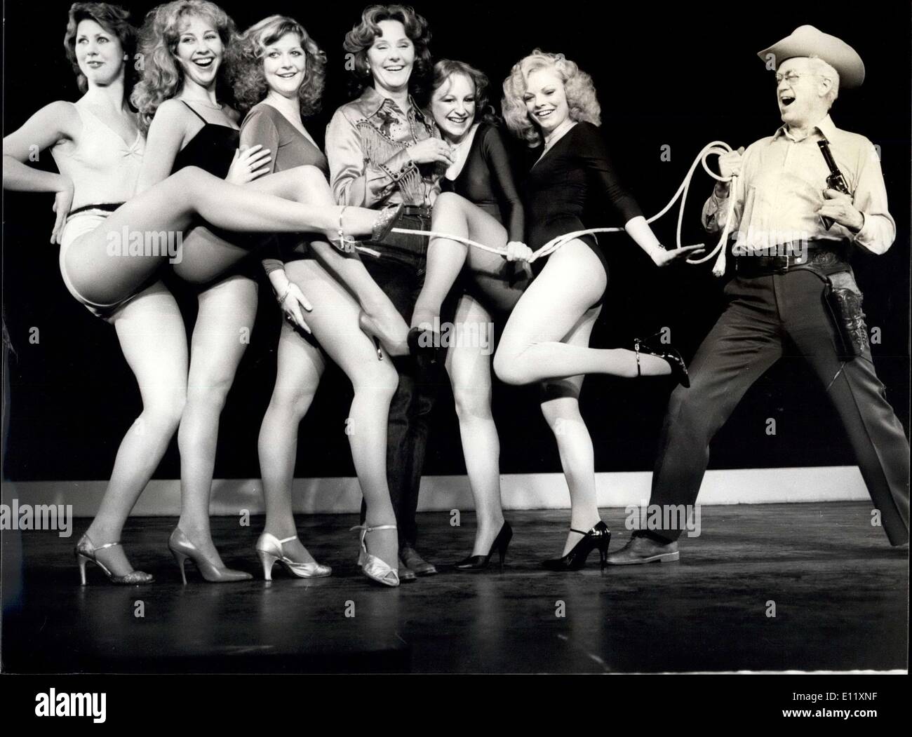 Feb. 05, 1981 - ''The Best Little Whorehouse in Texas'' to open in Drury Lane: The successful Broadway musical ''The Best Little Whorehouse in Texas'' is to open at the Theatre Royal, Drury Lane , on Thursday Feb 26th. Photo Shows Some of the girls from the chicken ranch get lassoed by the Sherigg Ed Earl Dodd (Henderson), They are from L - R: Lesley Guinn, the ''Madam'', Fiona Scoones, and Theresa Codling, during rehearsal at the Prince of Wales Theatre today. Stock Photo