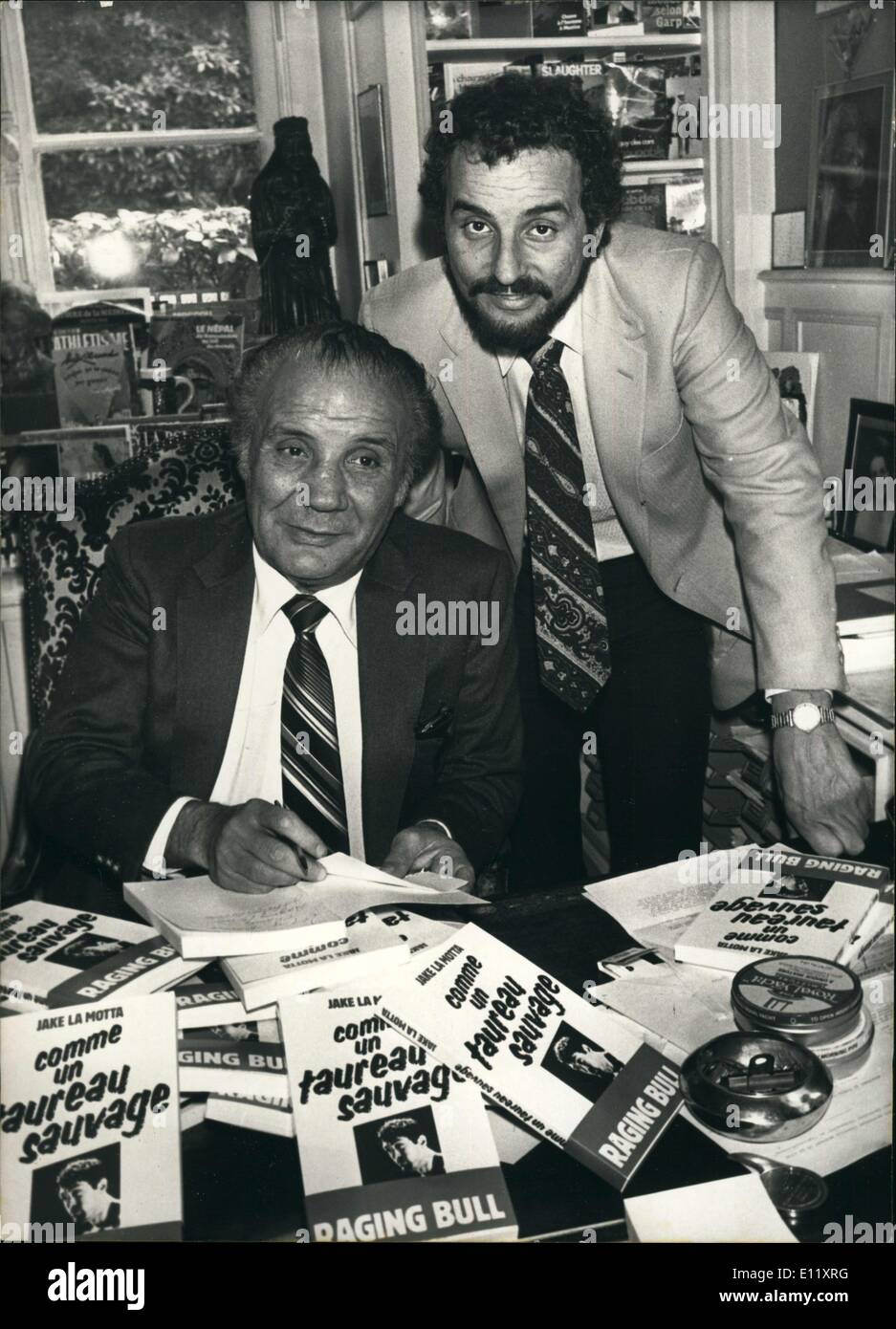 Feb. 25, 1981 - Boxing champ Jake La Motta & son with his book Stock Photo  - Alamy