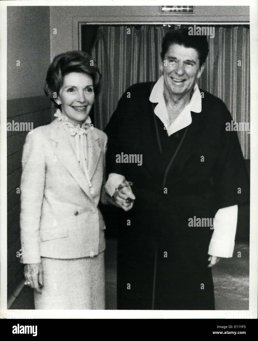 Apr. 03, 1981 - President and Mrs. Reagan taking a stroll down the corridor outside the hospital room at 12:30 p.m. Stock Photo