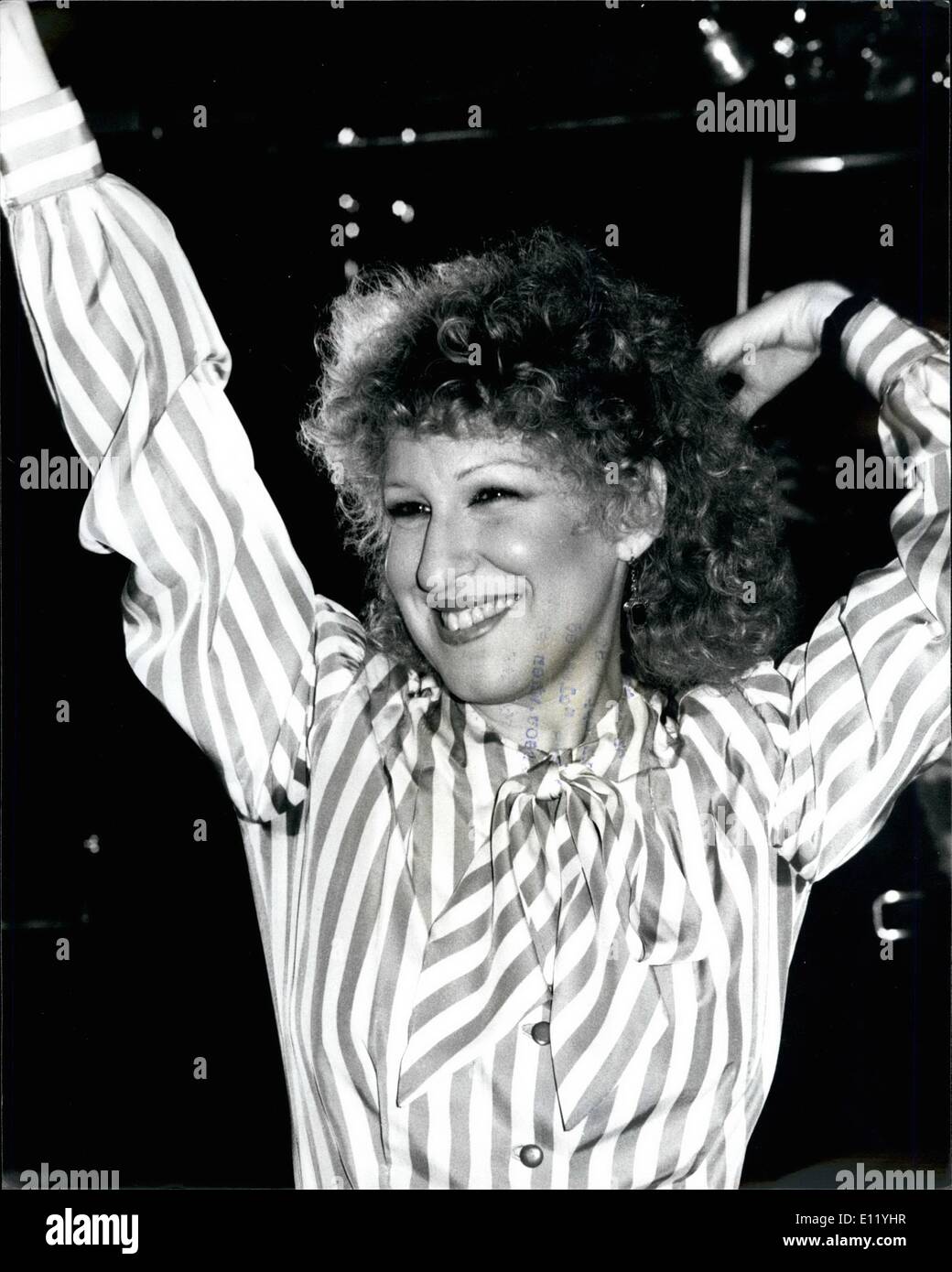 Jan. 01, 1981 - BETTE MIDLER IS IN TOWN Bette Midler, the outrageous American singing star is in *Lndon to promote her latest film,Divine Madnees,which one show at Stringfellow in upper St Martine Ione, in London yesterday. She said that she has ''cleaned up'' since her famous TV encounter with Michael Parkinson,when she offered to strip on his show. PHOTO SHOW: Bette Miper pictured during press conference in London Yesterday Stock Photo