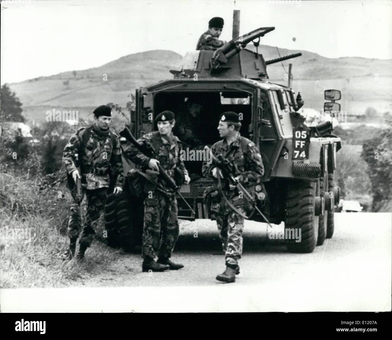 May 05, 1981 - Five soldiers killed in 1,000 bomb blast in Newey; The provisional Ira killed five members of the First Battalion of the Royal Green Jacket when their Saracan armoured personal carrier was blown to places by a bomb planted on a road between Newry and Carlough just four miles from the home of H block hunger striker, the third, Raymond McCreesh, 25, who is near death after 59 days of his fast, Wreckage fro mthe 10 ton Saracan car was hurled over 300 yards as the bomb was detonated by the assasins hidden in a wooden hillside Stock Photo