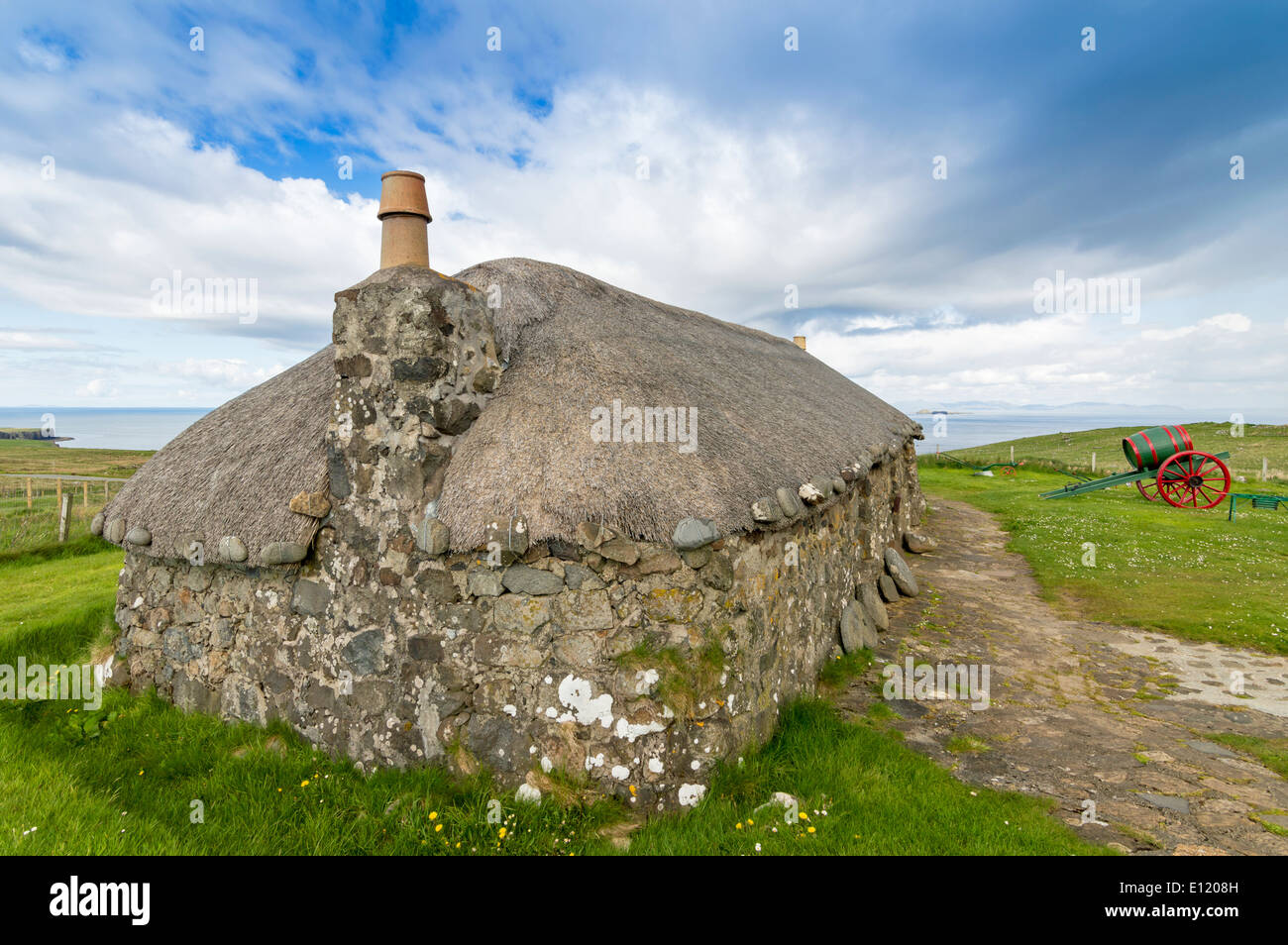 Thatch Roof On An Old Croft House Or Cottage Held Down By Stones