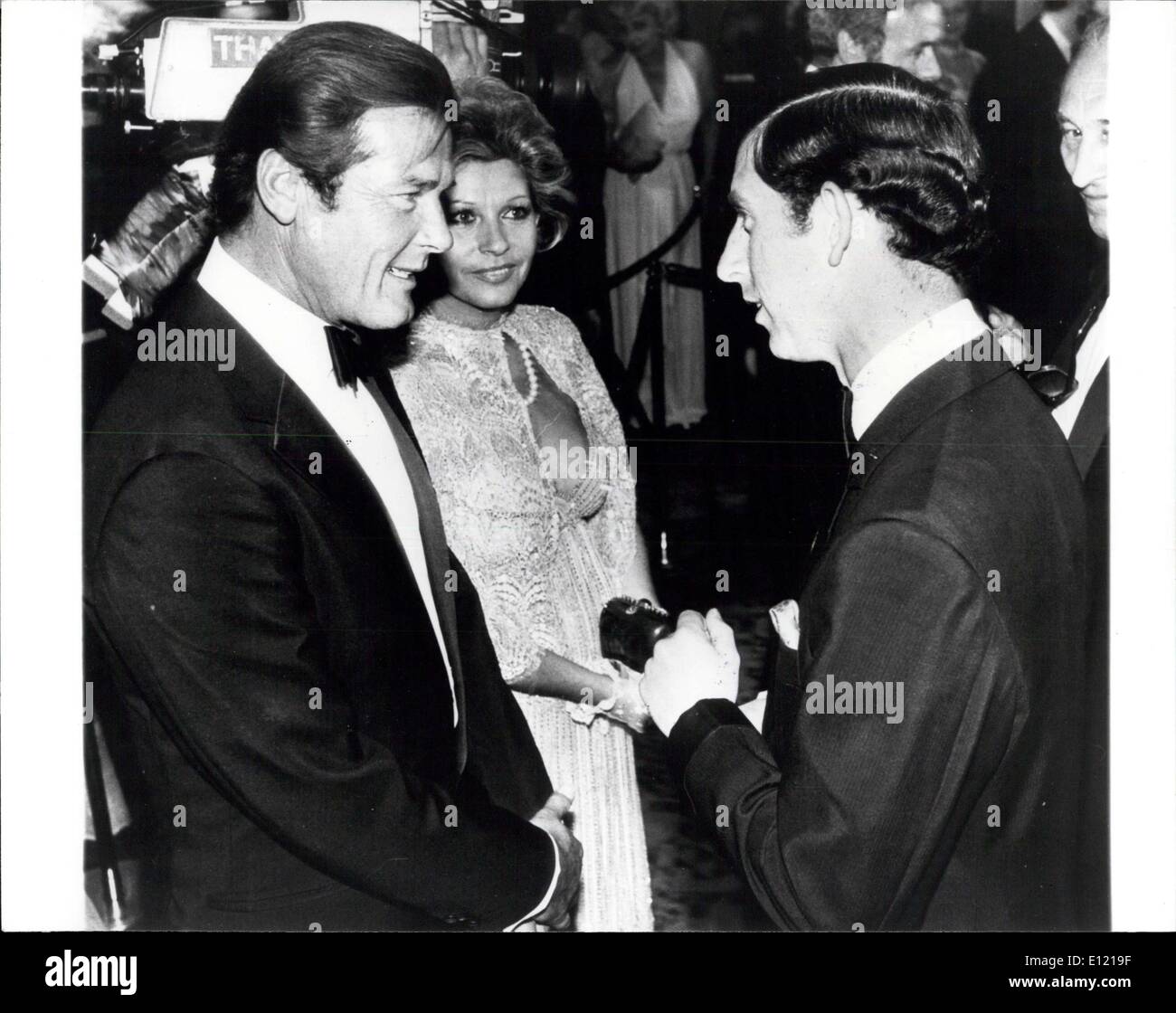 Jun. 25, 1981 - Premiere of the Latest James Bond Film 'For Your Eyes Only': Last night at the Odeon Leicester Square, Prince Charles and Lady Diana attended the premiere of the latest James Bond film, For Your Eyes Only. Photo Shows Prince seen talking to Roger Moore and his wife Luisa during last night's premiere of the James Bond film, For Your Eyes Only. Stock Photo