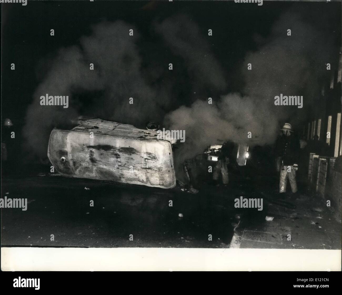 Jul. 07, 1981 - Barricades and Petrol Bombs a Brixton Erupts: The calm of Brixton broke last night when violence hits the streets. Ten policemen were hurt when stone-throwing black youths set fire to cars and vans and tried to build barricades after being driven by the police from Raliton Road in the early hours of the morning. The people of Brixton were angered by a group of a 100 police officers who went in the area yesterday morning searching about a dozen home looking for firebombs. Photo shows a burning van during the confrontation with the police in the streets of Brixton last night. Stock Photo