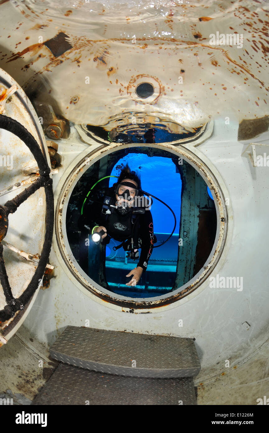 Diver inside wreck Stock Photo