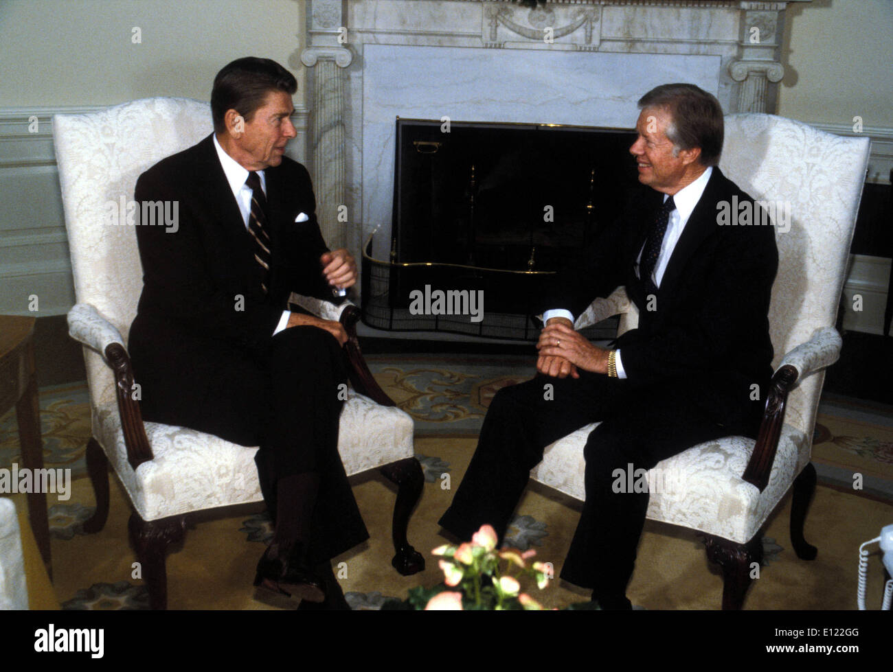 Aug 06, 1983; Washington, DC, USA; File photo, date unknown. United States Republican President RONALD REAGAN and former Democratic President JIMMY CARTER talk politics in the oval office.. (Credit Image: KEYSTONE Pictures USA/ZUMAPRESS.com) Stock Photo