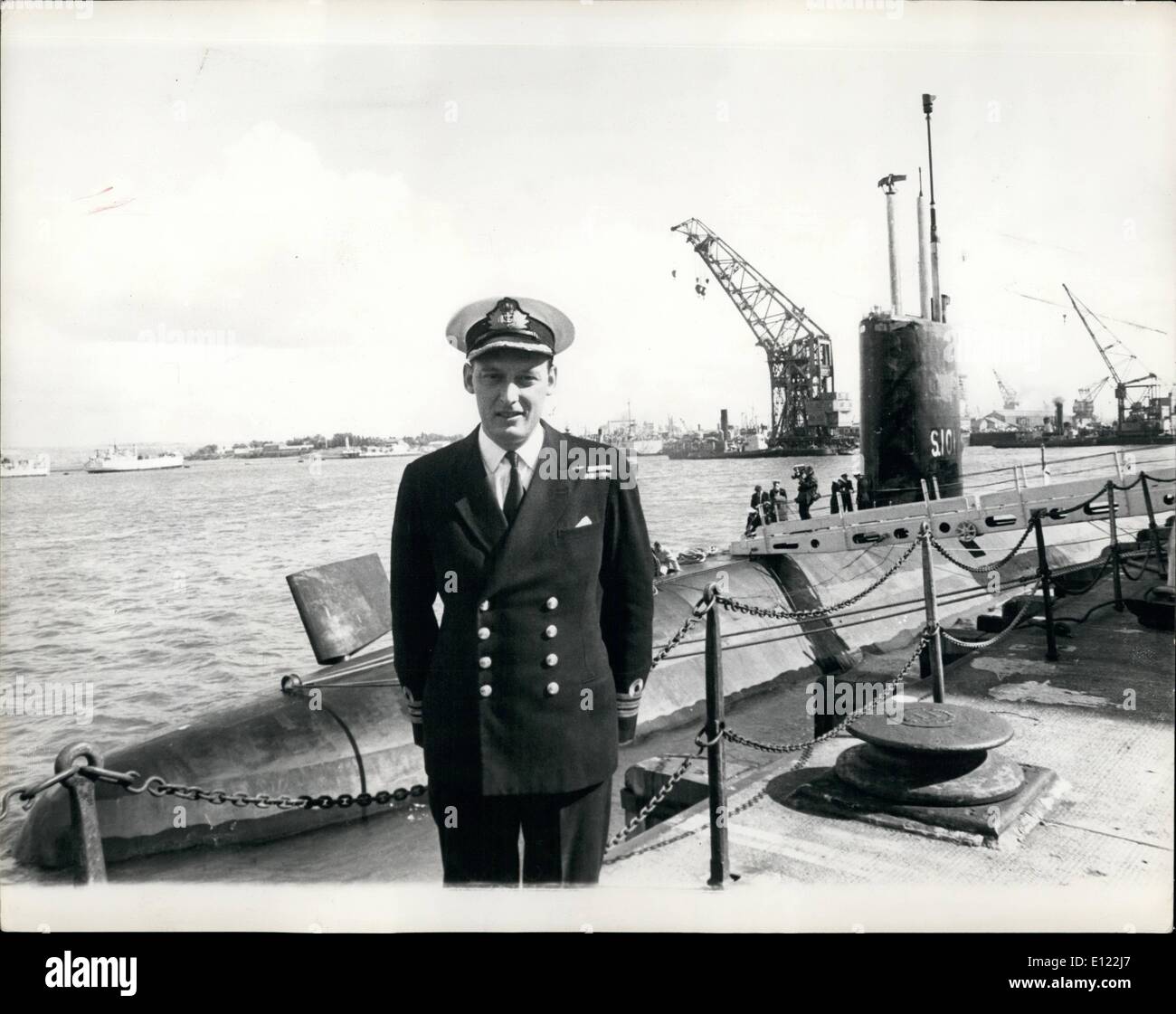 Sep. 09, 1983 - Deadnought at Sea; Britain's first nuclear powered submarine , ''Dreadnaught'' was exercising in the English Channel yesterday. Photo Shows The Dreadnaught's first Captain, Commander Barnaby Samborne seen on the Quay side at Portsmouth with his ship in the Background. Stock Photo