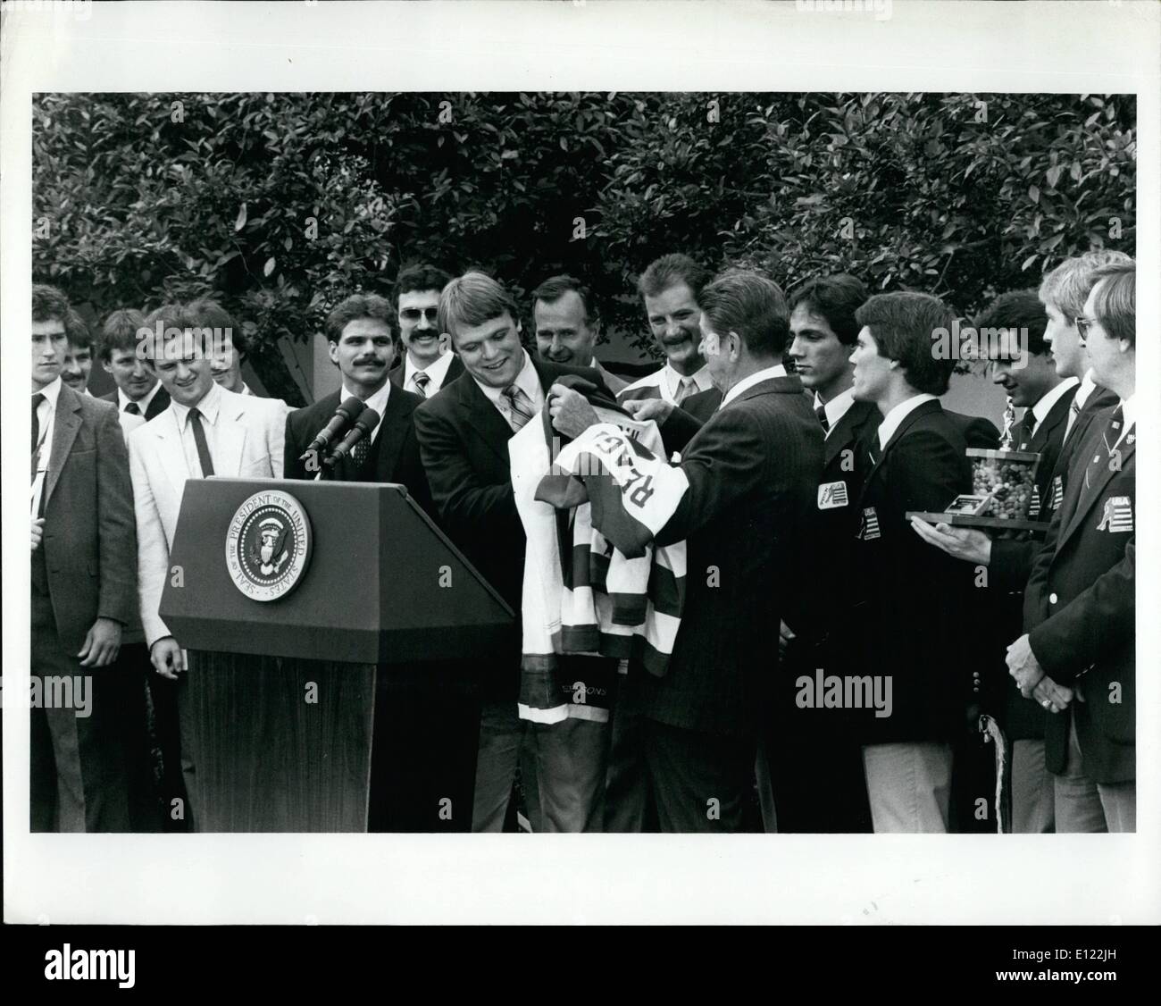 Sep. 09, 1983 - The U.S. Olympic Hockey team presents a team jersey to President Reagan. The team also gave the President a trophy filed with Jelly Beans. Stock Photo