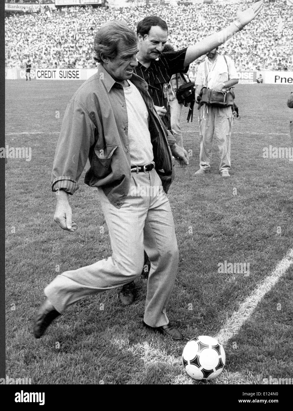 Actor Jean-Paul Belmondo kicks soccer ball Stock Photo