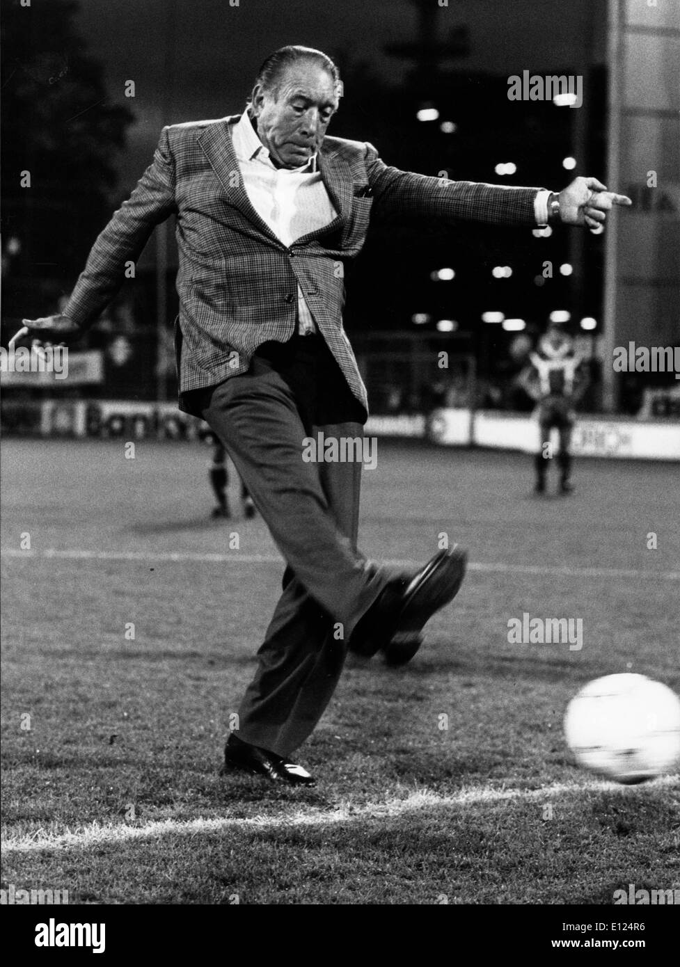 Oct 29, 1990; Zurich, Switzerland; Oscar winning actor ANTHONY QUINN (1915-2001), kicks off the Zurich vs. Geneva soccer game.. Stock Photo